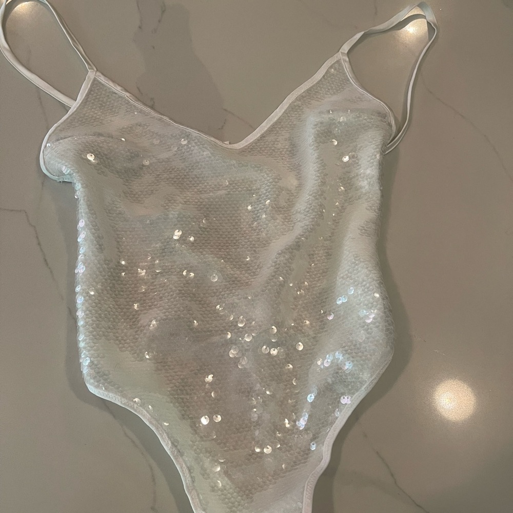 Sequin satin and mesh lace up bodysuit.